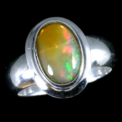 silver-and-opal-ring-large-oval-in-thick-casing