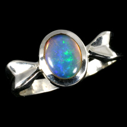 silver-and-opal-ring-oval-in-bow-style-casing