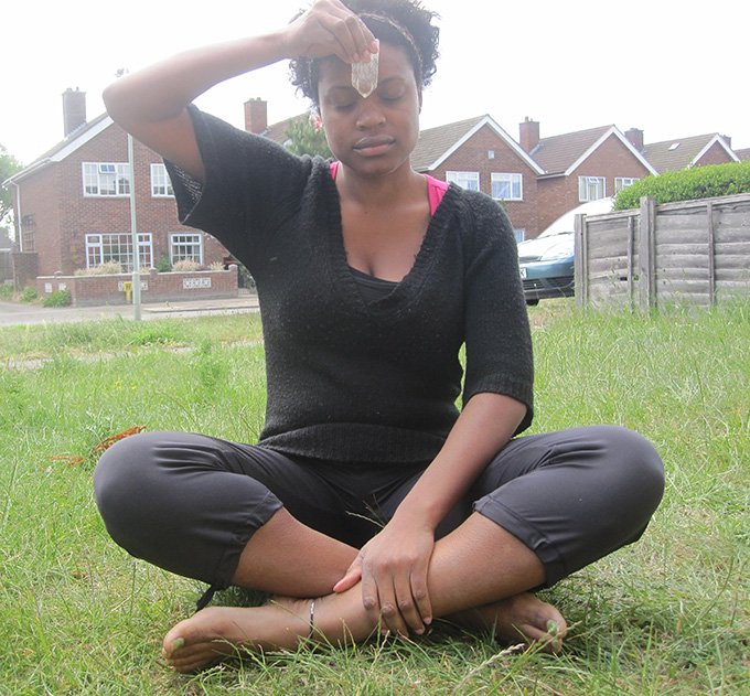 Clear Quartz being used when meditating